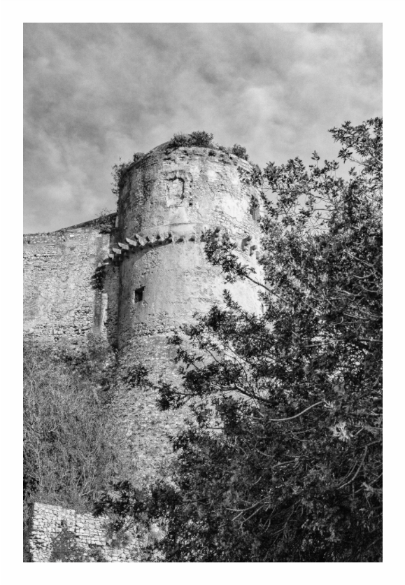 Main image Tower in Abruzzo, Abruzzo tower architecture print, isolated medieval stone structure on Italian hillside, moody gray earth tones, fine art street photography, minimalist countryside wall art