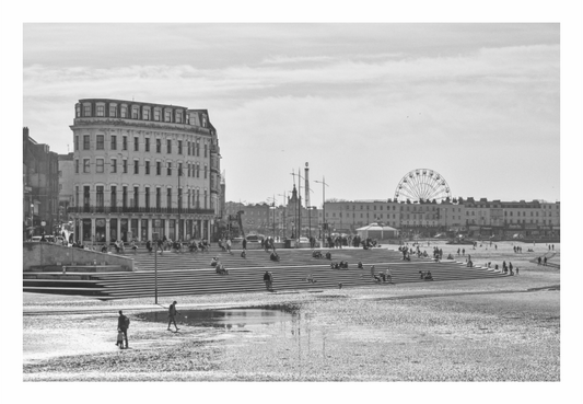 Black and white photograph of a city square with people, buildings, and a Ferris wheel, Black and white fine art photograph of Margate Town, Kent, as viewed from the harbour arm.